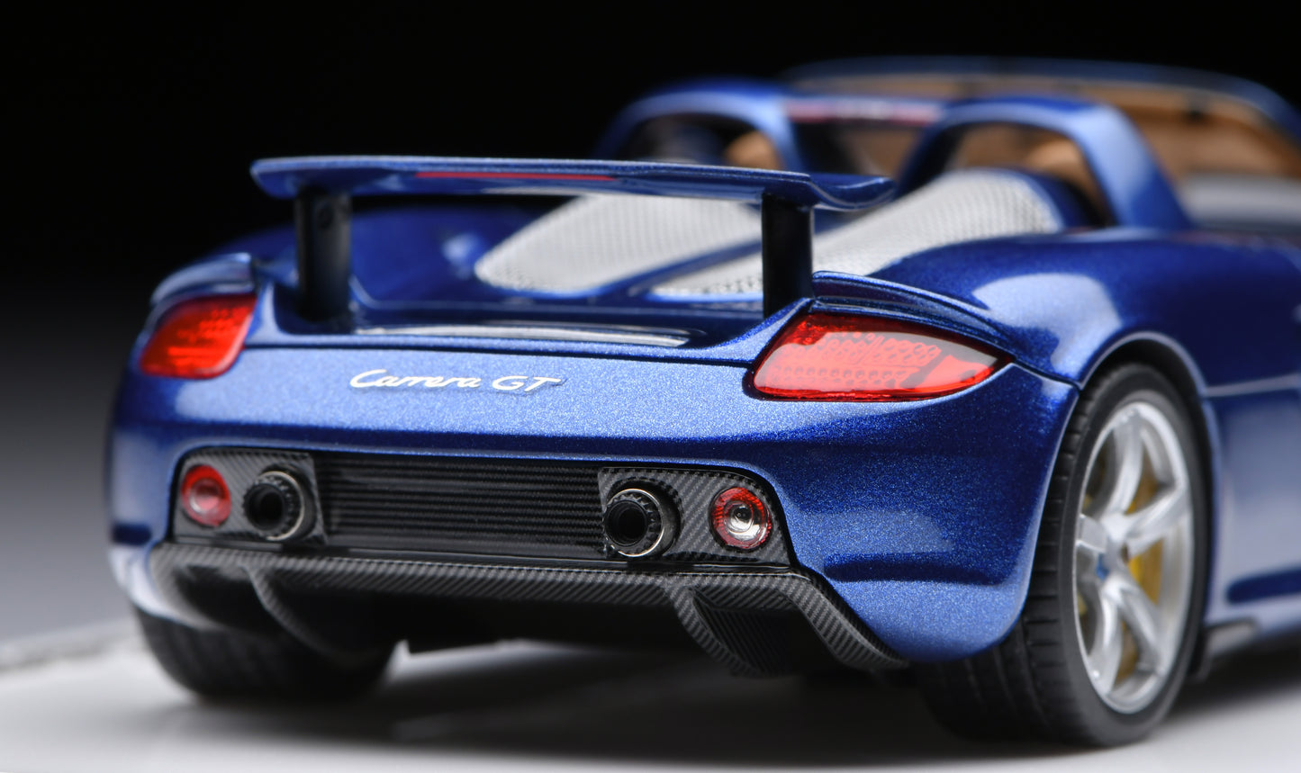 1:43 MakeUp Porsche Carrera GT(Rear wing up)  Topaz Blue Metallic EM567J