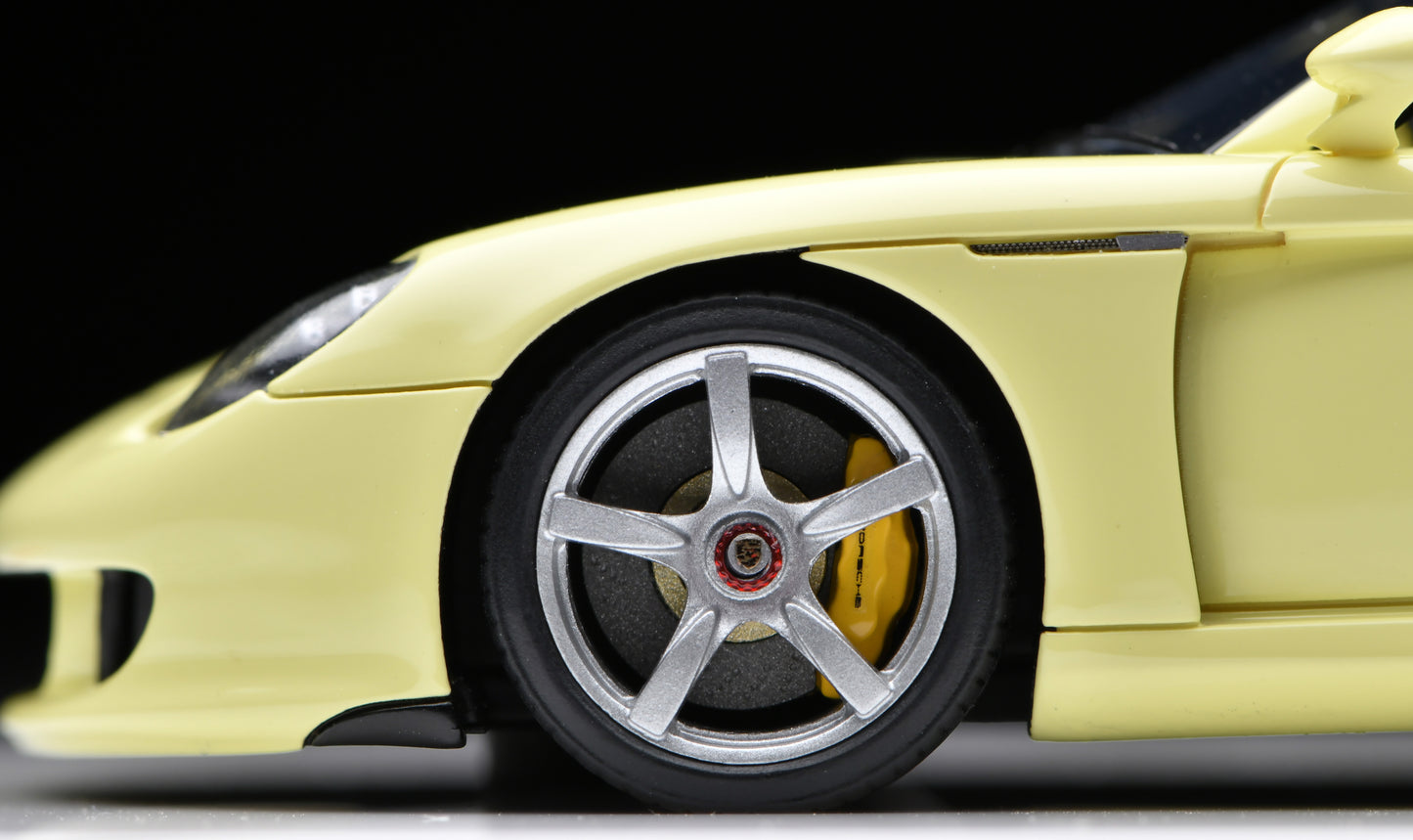 1:43 MakeUp Porsche Carrera GT(Rear wing up) Condor Yellow EM567I