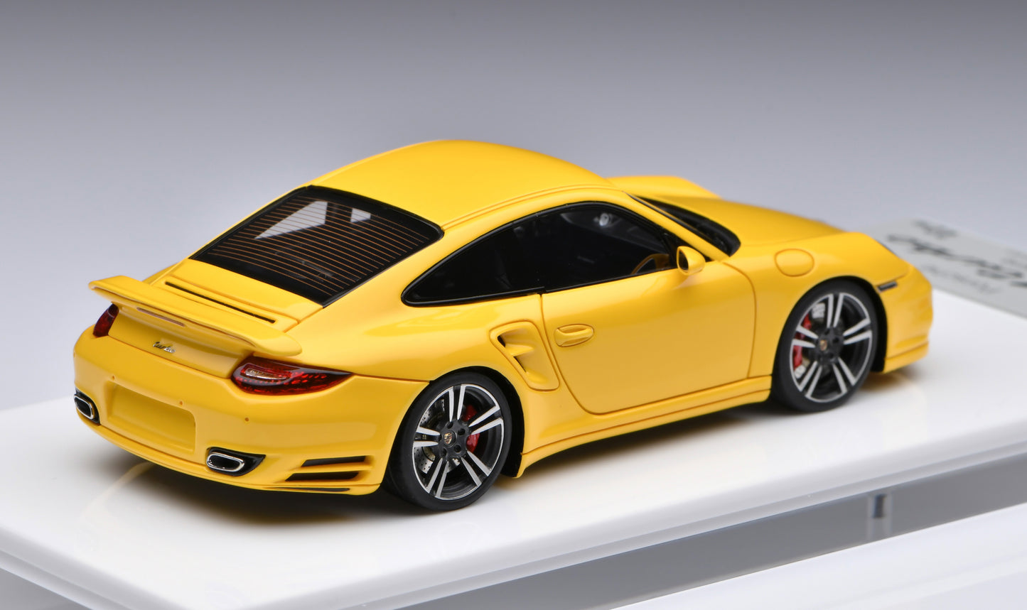 1:43 MakeUp Porsche 911 (997.2) Turbo 2010 Speed Yellow EM619A